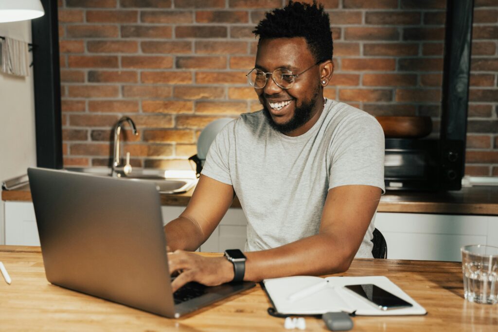 Affiliate Marketing for Beginners – Work from Anywhere Man using laptop to learn affiliate marketing for beginners