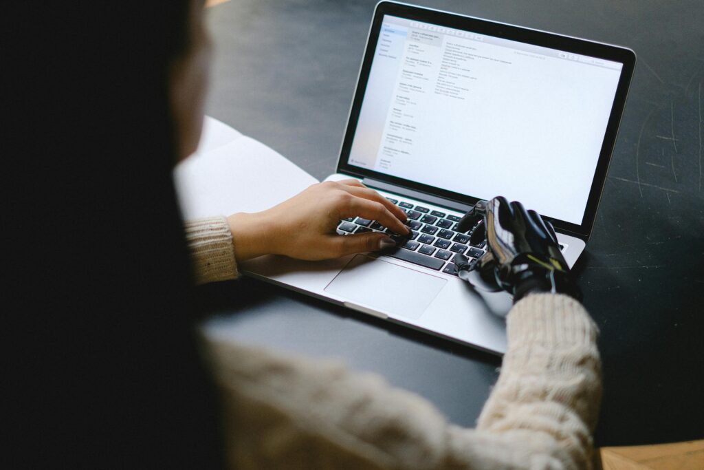 How to Start an Online Business in 2025 - Work from Home Woman working on laptop from home learning how to start an online business in 2025